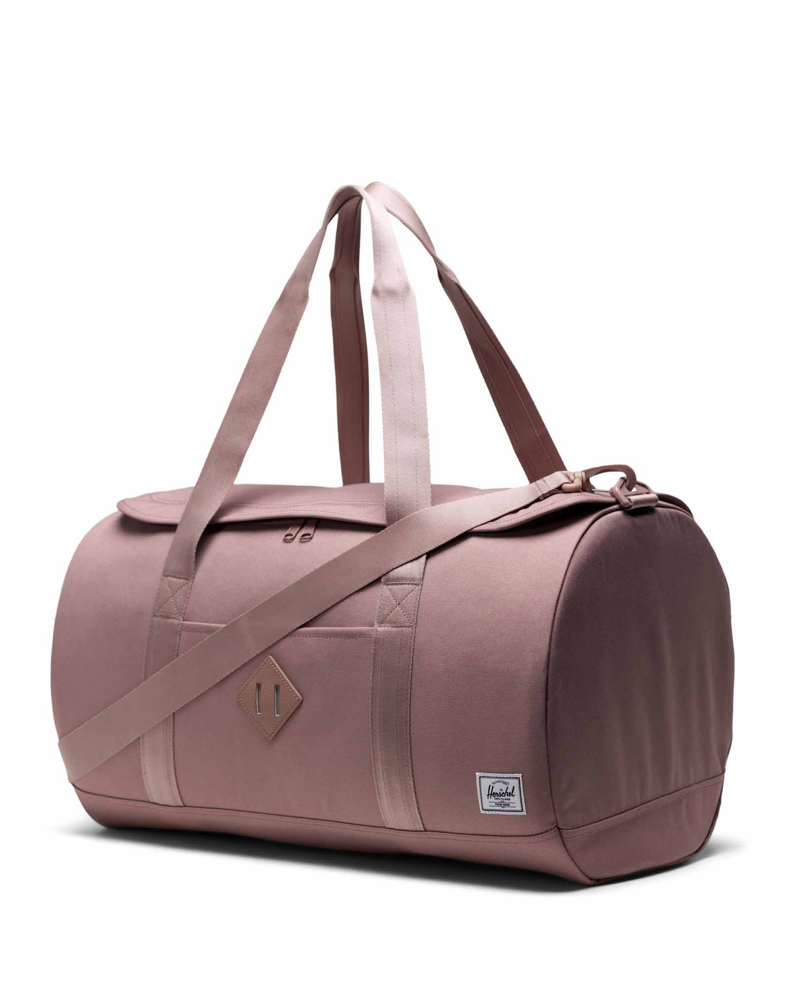 Pink herschel hotsell duffle bag